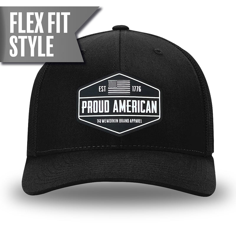 All Black Flex Fit style WeWorkin hat—Woven front with Poly mesh sides and back, Richardson 110 brand (R-Flex trucker). WeWorkin "PROUD AMERICAN" silicone patch is centered on the front panels.