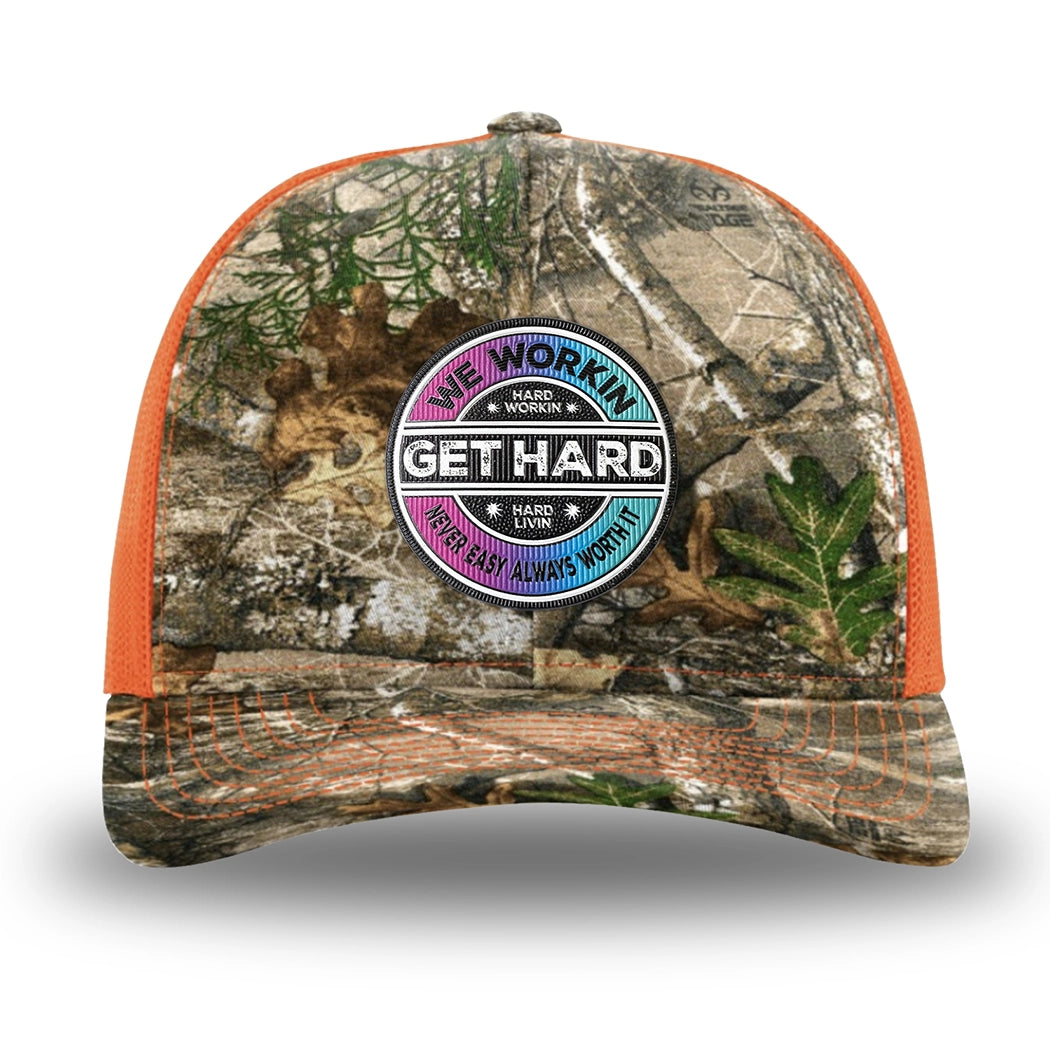 Neon Orange and RealTree Camo two-tone WeWorkin hat—Richardson 112 brand snapback, retro trucker classic hat style. WE WORKIN custom GET HARD patch made of thermoplastic, lightweight, durable material is centered on the front panels.