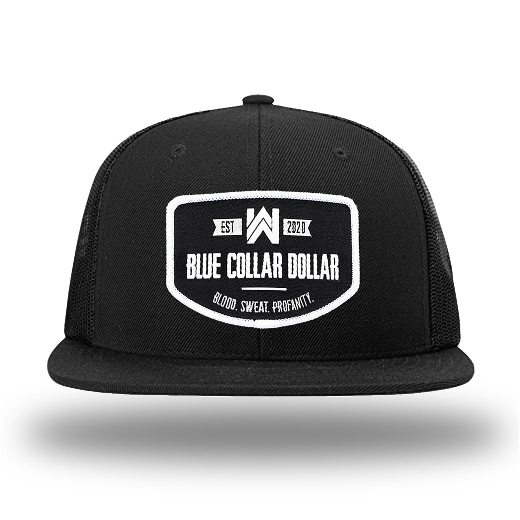 Solid Black WeWorkin hat—Richardson 511 brand snapback, flatbill trucker hat style. WeWorkin "Blue Collar Dollar" curve-bottom patch is centered large on the front panels.