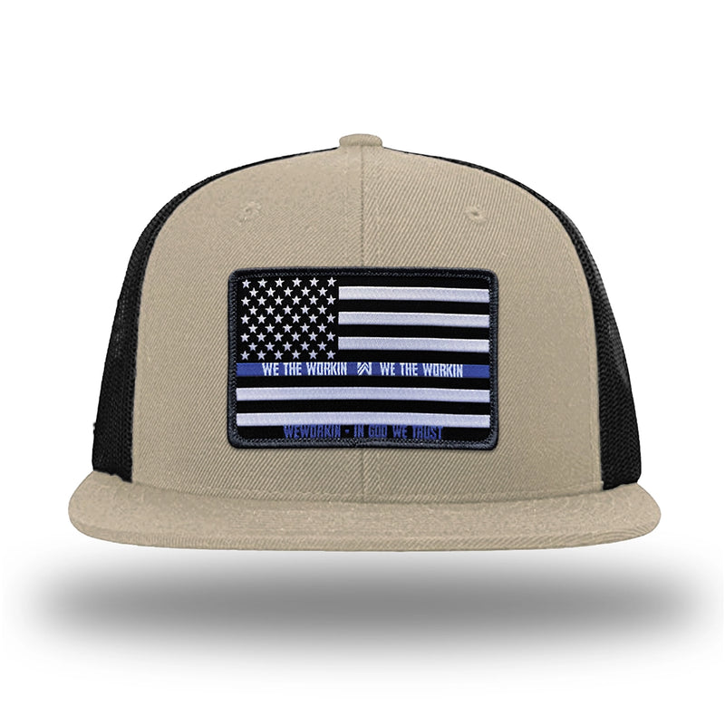 Khaki/Black WeWorkin hat—Richardson 511 brand snapback, flatbill trucker hat style. LEO FLAG woven patch with black merrowed edge is centered on the front panels.