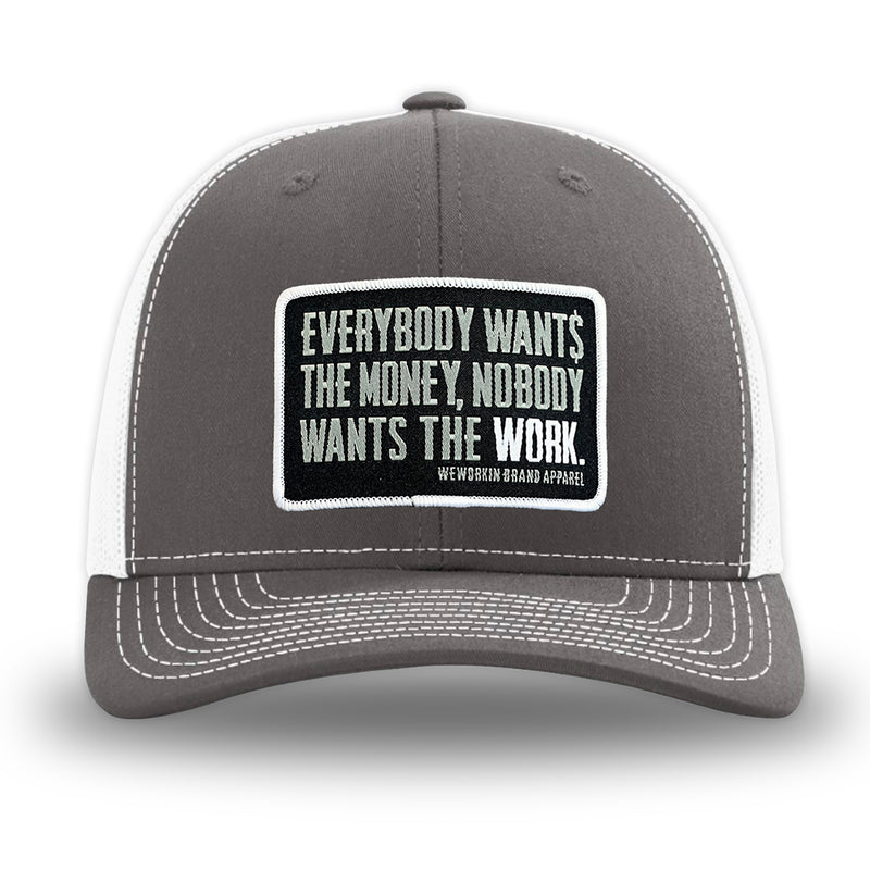 Charcoal/White WeWorkin hat—Richardson 112 brand snapback, retro trucker classic hat style. WeWorkin "Everybody Want$ the Money, Nobody Wants the WORK." patch is centered on the front panels.