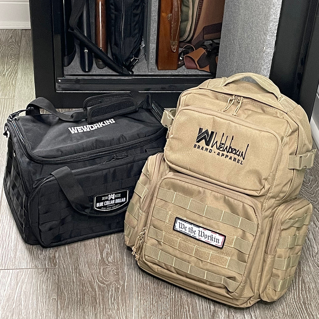 BAGS Collection. 2 WW Bags (WW Script logo on Desert Tan Backpack and WW Block logo on Black Range Bag) sitting beside a gun safe.