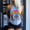 Woman from front, wearing a WW athletic heather grey cropped tank. 3-color BARBELL CREW design in Neon Pink to Bright yellow fade and black, "WE WORKIN" main text is arched over top of "THE WORKIN CLASS" text and "Barbell Crew" script across the bottom—a Barbell at the bottom—design is printed large on the front.