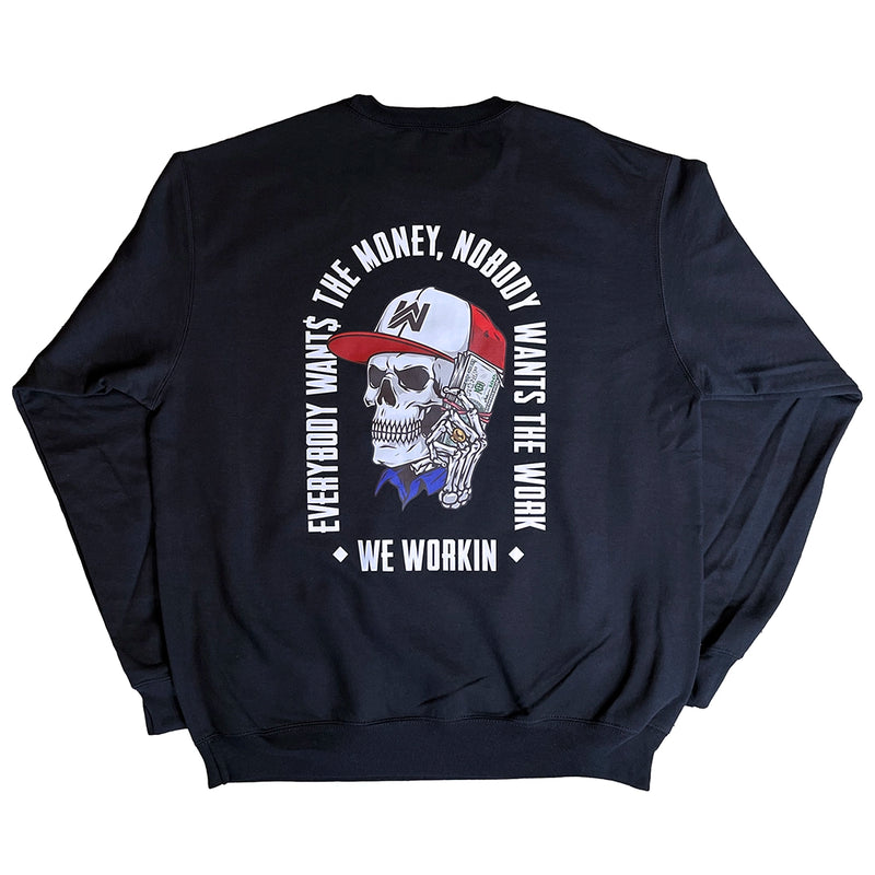 Back of our Black crewneck sweatshirt with a large "EVERYBODY WANT$ THE MONEY, NOBODY WANTS THE WORK" tagline and WE WORKIN text, surrounding a Skull wearing a hat and holding a money bundle to his ear. Skull graphic in color, text in white.