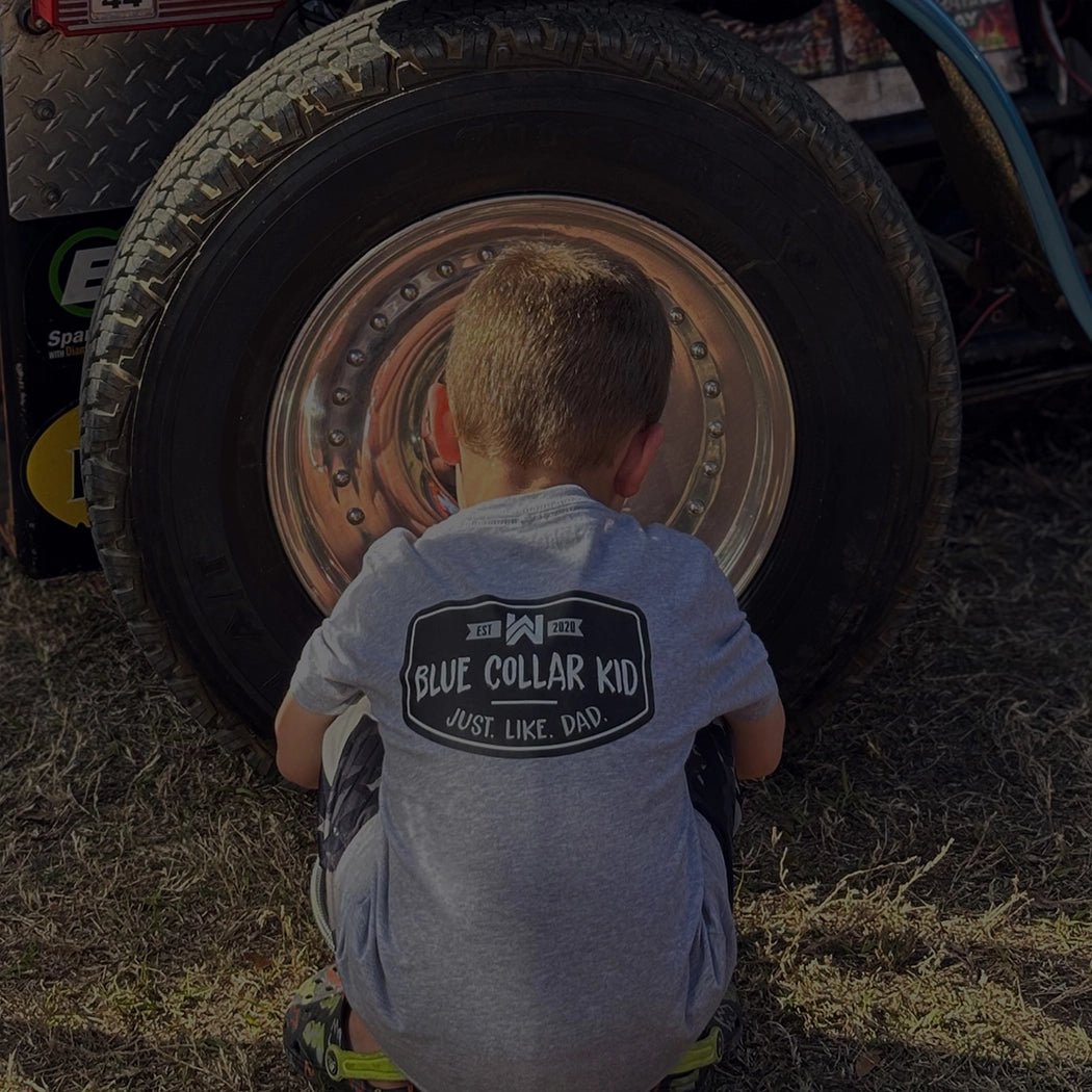 KIDS COLLECTION: TODDLER PICTURED IN A "BLUE COLLAR KID" GREY TEE