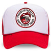 A WeWorkin Foam Trucker Snapback Hat in a Red/White colorway, on a white background, pictured from the front. The centered front panel design includes a circular red-beaded border on white background with red lips-mouth "crunching down" on a skull between teeth in the center, the text "PASSION IS PRICELESS • WHAT EVER IT TAKES" encircling center graphic in black ink.