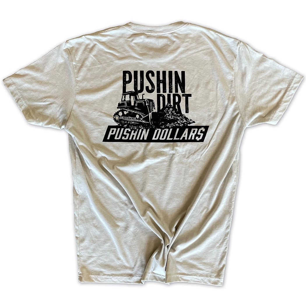 Back of a WW Desert Sand color Graphic Tee. "PUSHIN DIRT. PUSHIN DOLLAR$" bulldozer graphic printed in black, across full upper back area, on white background.
