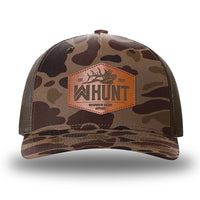 Bark Duck Camo/Brown two-tone WeWorkin hat—Richardson 112PFP snapback, 5-panel trucker, mesh-back style. WeWorkin "WW HUNT" etched leather patch with stitched border is centered on the front panel.