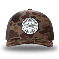 Bark Duck Camo/Brown two-tone WeWorkin hat—Richardson 112PFP snapback, 5-panel trucker, mesh-back style. WeWorkin "Hard Workin. Hard Livin. Proud American." circular silicone patch is centered on the front panel.