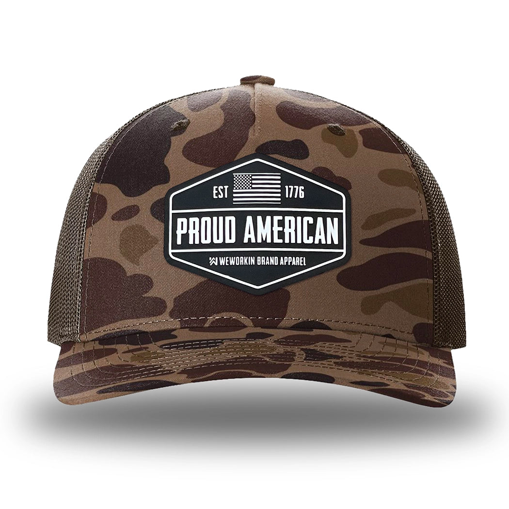 Bark Duck Camo/Brown two-tone WeWorkin hat—Richardson 112PFP snapback, 5-panel trucker, mesh-back style. WeWorkin "PROUD AMERICAN" silicone patch is centered on the front panel.