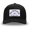 All Black Flex Fit style WeWorkin hat—Woven front with Poly mesh sides and back, Richardson 110 brand (R-Flex trucker). BLUE COLLAR DOLLAR ARCH (BCD-ARCH) woven patch with black merrowed edge, on a white background with black text, is centered on the front panels.