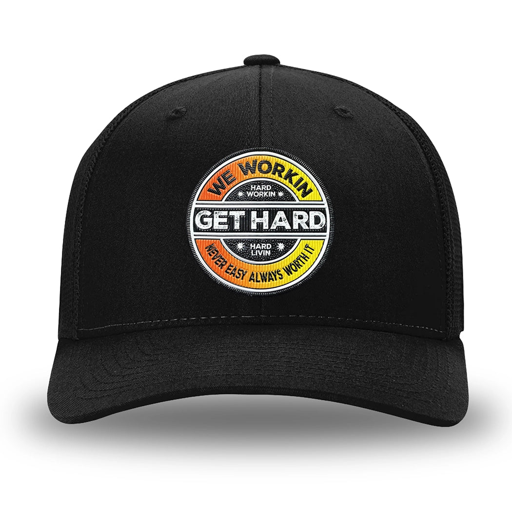 All Black Flex Fit style WeWorkin hat—Woven front with Poly mesh sides and back, Richardson 110 brand (R-Flex trucker). WE WORKIN custom GET HARD patch made of thermoplastic, lightweight, durable material is centered on the front panels in orange to yellow fade and black colors.