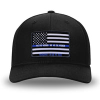 All Black Flex Fit style WeWorkin hat—Woven front with Poly mesh sides and back, LEO FLAG woven patch with black merrowed edge is centered on the front panels.