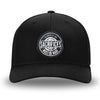 All Black Flex Fit style WeWorkin hat—Woven front with Poly mesh sides and back, Richardson 110 brand (R-Flex trucker). WeWorkin "SACRIFICES MUST BE MADE" circular woven patch is centered on the front panels.