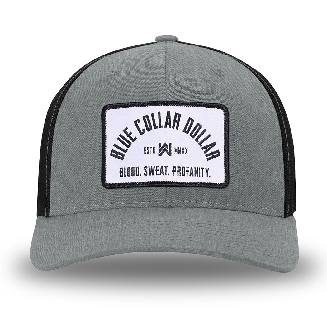 Heather Grey/Black Flex Fit style WeWorkin hat—Woven front with Poly mesh sides and back, Richardson 110 brand (R-Flex trucker). BLUE COLLAR DOLLAR ARCH (BCD-ARCH) woven patch with black merrowed edge, on a white background with black text, is centered on the front panels.