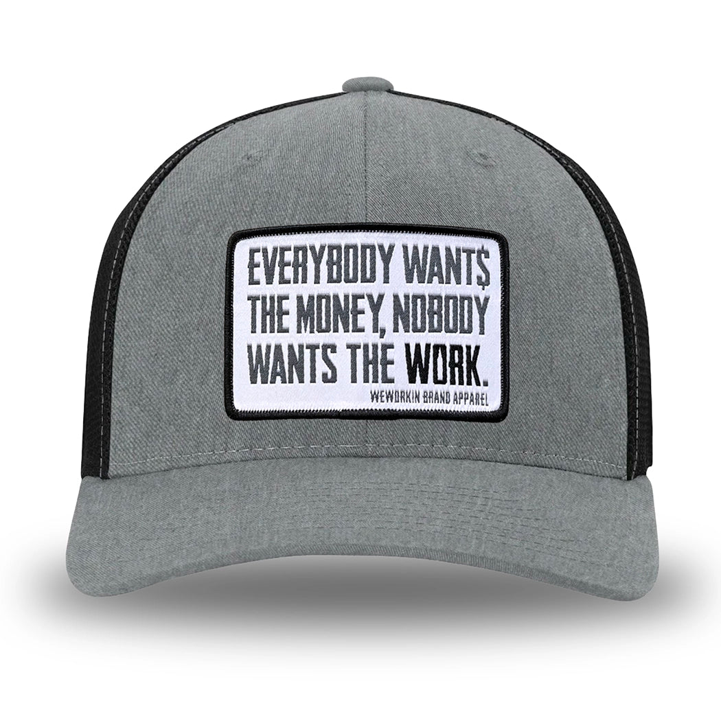 Heather Grey/Black Flex Fit style WeWorkin hat—Woven front with Poly mesh sides and back, Richardson 110 brand (R-Flex trucker). WeWorkin "Everybody Want$ the Money, Nobody Wants the WORK." [white bkgd] rectangular woven patch is centered on the front panels.