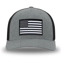 Heather Grey/Black Flex Fit style WeWorkin hat—Woven front with Poly mesh sides and back, Richardson 110 brand (R-Flex trucker). WeWorkin "American Flag" rectangular patch is centered on the front panels.