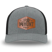 Heather Grey/Black Flex Fit style WeWorkin hat—Woven front with Poly mesh sides and back, Richardson 110 brand (R-Flex trucker). WeWorkin "WW HUNT" etched leather patch with stitched border is centered on the front panels.