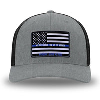 Heather Grey/Black Flex Fit style WeWorkin hat—Woven front with Poly mesh sides and back, Richardson 110 brand (R-Flex trucker). LEO FLAG woven patch with black merrowed edge is centered on the front panels.