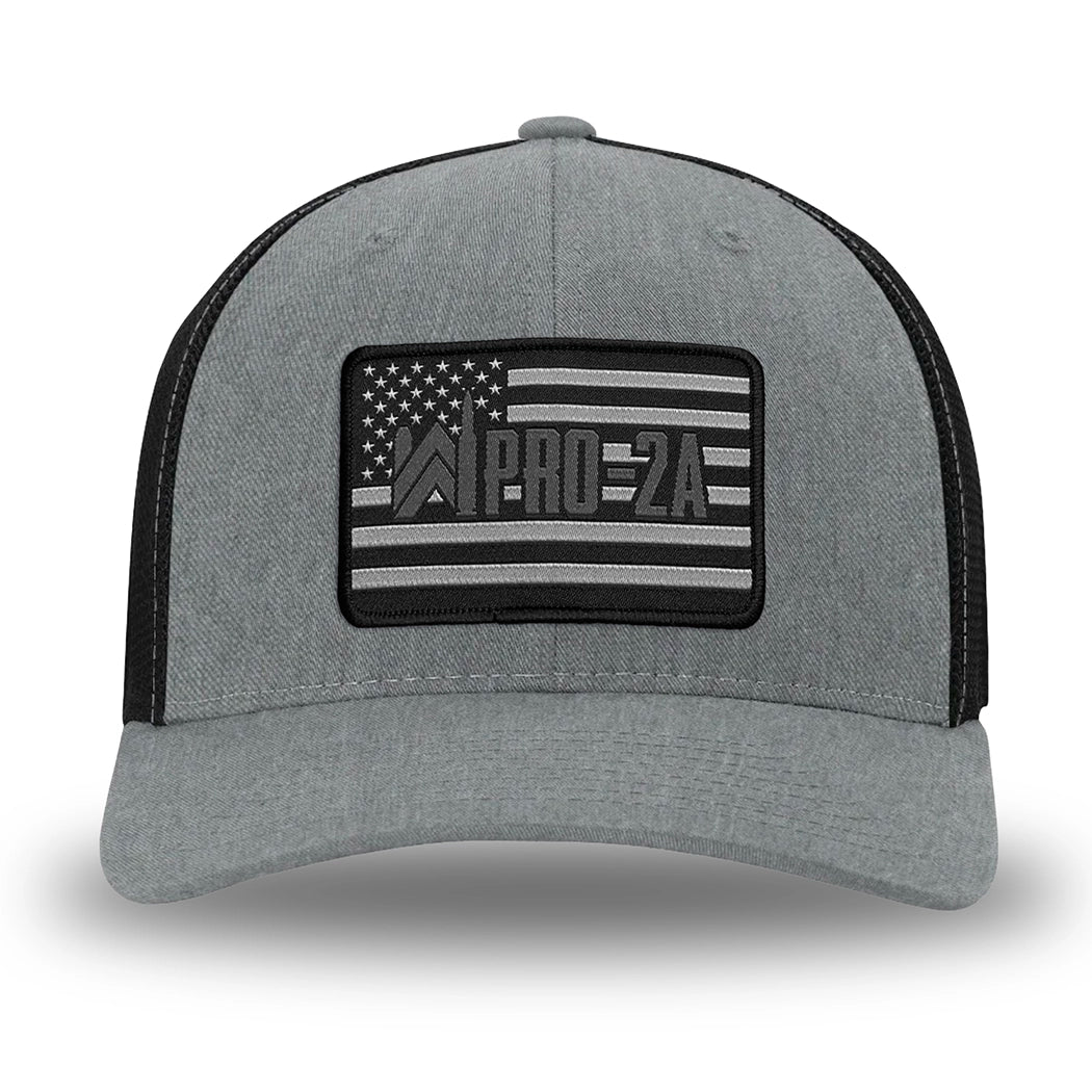 Heather Grey/Black Flex Fit style WeWorkin hat—Woven front with Poly mesh sides and back, Richardson 110 brand (R-Flex trucker). PRO-2A woven patch with black merrowed edge is centered on the front panels.