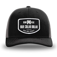 Black and Charcoal Grey two-tone WeWorkin hat—Richardson 112 brand snapback, retro trucker classic hat style. WeWorkin "Blue Collar Dollar" curved-bottom woven patch is centered on the front panels.