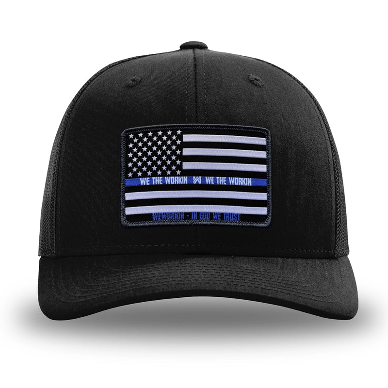 Solid Black WeWorkin hat—Richardson 112 brand snapback, retro trucker classic hat style. LEO FLAG woven patch with black merrowed edge is centered on the front panels.