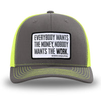 Neon/Safety Yellow and Charcoal Grey two-tone WeWorkin hat—Richardson 112 brand snapback, retro trucker classic hat style. WeWorkin "Everybody Want$ the Money, Nobody Wants the WORK." [White Bkgd] rectangular woven patch is centered on the front panels.