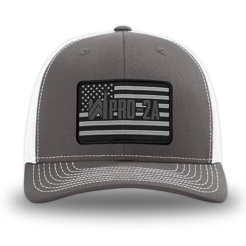 Charcoal/White WeWorkin hat—Richardson 112 brand snapback, retro trucker classic hat style. PRO-2A woven patch with black merrowed edge is centered on the front panels.