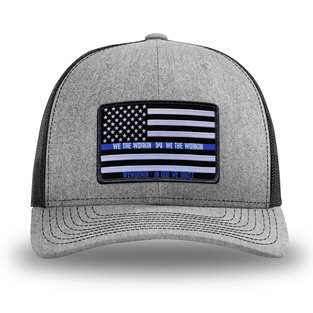 Heather Grey/Black WeWorkin hat—Richardson 112 brand snapback, retro trucker classic hat style. LEO FLAG woven patch with black merrowed edge is centered on the front panels.