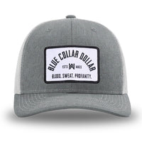 Heather Grey front panels/brim and Light Grey side/back mesh panels for this two-tone WeWorkin hat—Richardson 112 brand snapback, retro trucker style. BLUE COLLAR DOLLAR ARCH (BCD-ARCH) woven patch with black merrowed edge, on a white background with black text, is centered on the front panels.