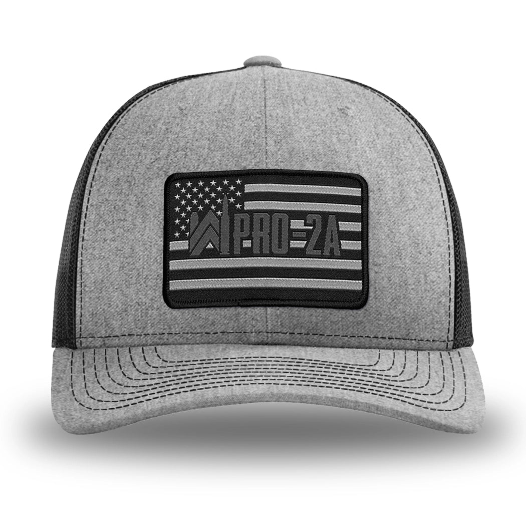 Heather Grey/Black WeWorkin hat—Richardson 112 brand snapback, retro trucker classic hat style. PRO-2A woven patch with black merrowed edge is centered on the front panels.