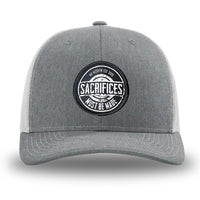 Heather Grey front panels/brim and Light Grey side/back mesh panels for this two-tone WeWorkin hat—Richardson 112 brand snapback, retro trucker style. WeWorkin "SACRIFICES MUST BE MADE" circular woven patch is centered on the front panels.
