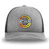 Heather Grey/Black WeWorkin hat—Richardson 112 brand snapback, retro trucker classic hat style. WE WORKIN custom GET HARD patch made of thermoplastic, lightweight, durable material is centered on the front panels in orange to yellow fade and black colors.