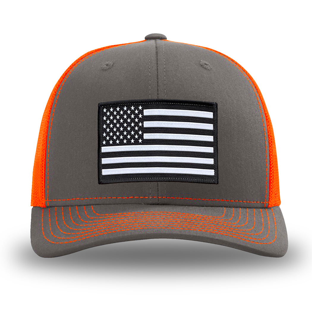 Neon/Safety Orange and Charcoal Grey two-tone WeWorkin hat—Richardson 112 brand snapback, retro trucker classic hat style. WeWorkin "American Flag" rectangular patch is centered on the front panels.