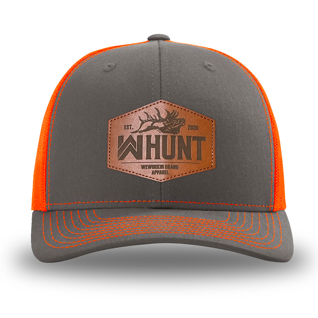 Neon/Safety Orange and Charcoal Grey two-tone WeWorkin hat—Richardson 112 brand snapback, retro trucker classic hat style. WeWorkin "WW HUNT" etched leather patch with stitched border is centered on the front panels.