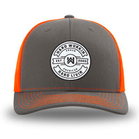 Neon/Safety Orange and Charcoal Grey two-tone WeWorkin hat—Richardson 112 brand snapback, retro trucker classic hat style. WeWorkin "Hard Workin. Hard Livin. Proud American." circular PVC patch is centered on the front panels.