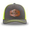 Neon/Safety Yellow and Charcoal Grey two-tone WeWorkin hat—Richardson 112 brand snapback, retro trucker classic hat style. WeWorkin "WW HUNT" etched leather patch with stitched border is centered on the front panels.