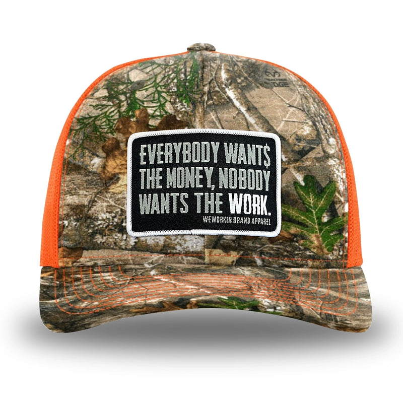 Neon Orange and RealTree Camo two-tone WeWorkin hat—Richardson 112 brand snapback, retro trucker classic hat style. WeWorkin "Everybody Want$ the Money, Nobody Wants the WORK." rectangular woven patch is centered on the front panels.