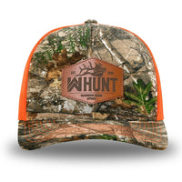 Neon Orange and RealTree Camo two-tone WeWorkin hat—Richardson 112 brand snapback, retro trucker classic hat style. WeWorkin "WW HUNT" etched leather patch with stitched border is centered on the front panels.