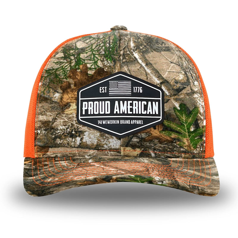 Neon Orange and RealTree Camo two-tone WeWorkin hat—Richardson 112 brand snapback, retro trucker classic hat style. WeWorkin "PROUD AMERICAN" PVC patch is centered on the front panels.