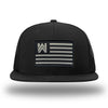 Solid Black WeWorkin hat—Richardson 511 brand snapback, flatbill trucker hat style. WE WORKIN FLAG woven patch with black merrowed edge is centered on the front panels.