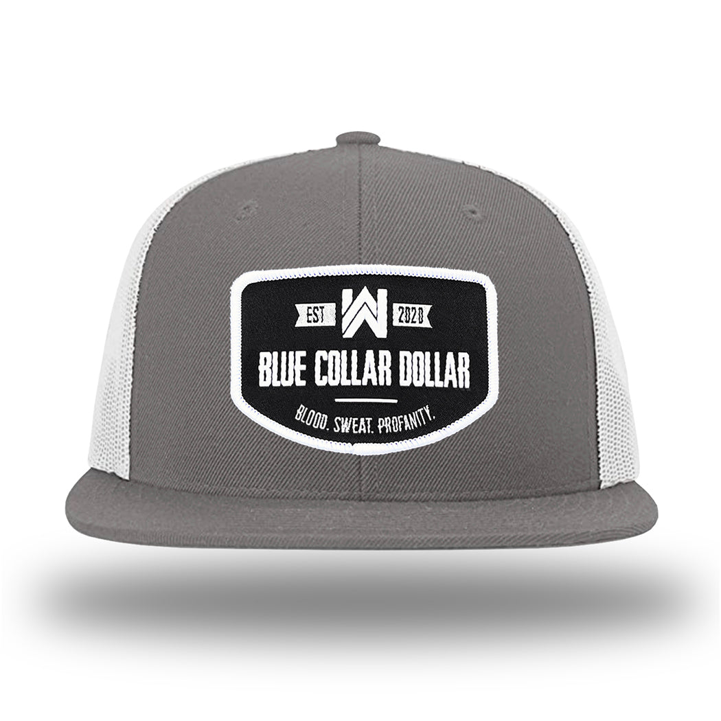 Charcoal/White WeWorkin hat—Richardson 511 brand snapback, flatbill trucker hat style. WeWorkin "Blue Collar Dollar" curve-bottom patch is centered large on the front panels.