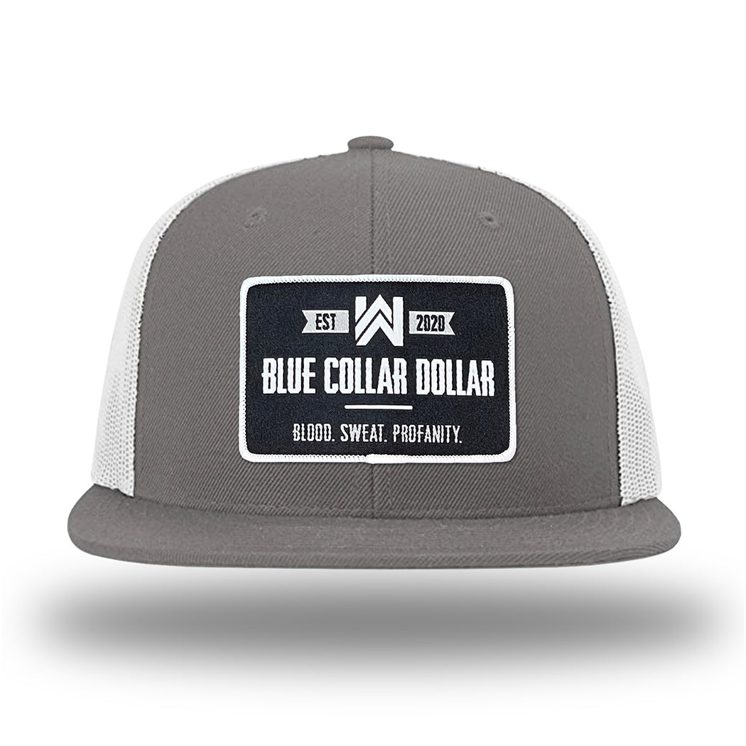 Charcoal/White WeWorkin hat—Richardson 511 brand snapback, flatbill trucker hat style. WeWorkin "Blue Collar Dollar" rectangle patch is centered large on the front panels. 