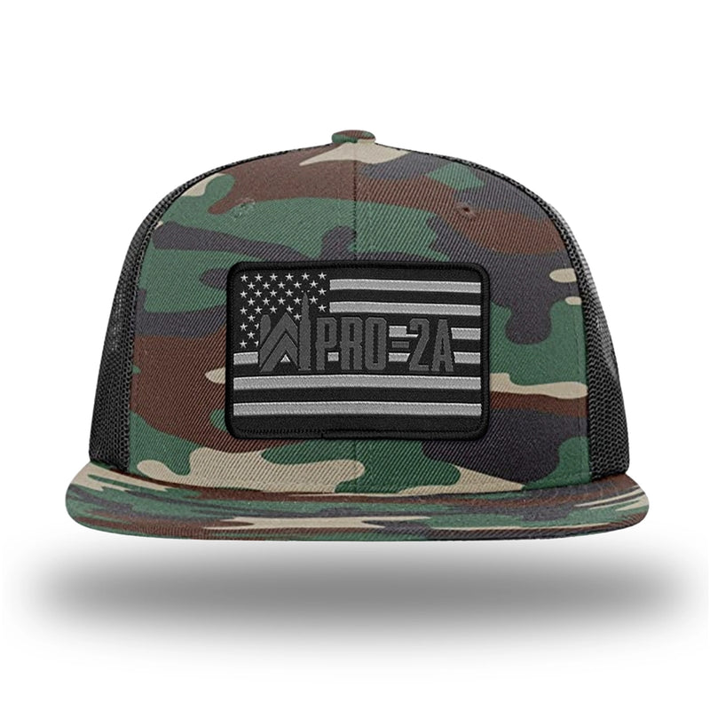 Green Camo/Black WeWorkin hat—Richardson 511 brand snapback, flatbill trucker hat style. PRO-2A woven patch with black merrowed edge is centered on the front panels.