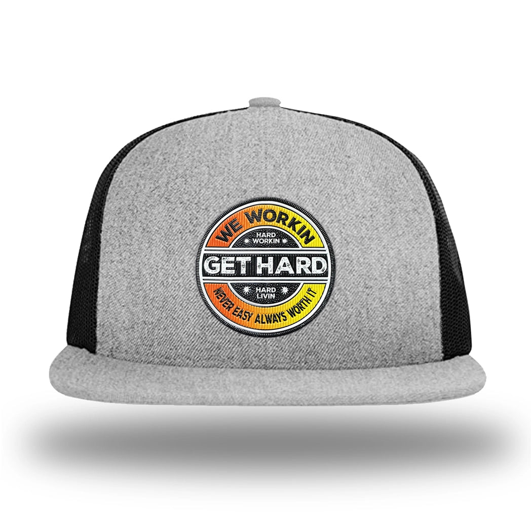 Heather Grey/Black WeWorkin hat—Richardson 511 brand snapback, flatbill trucker hat style. WE WORKIN custom GET HARD patch made of thermoplastic, lightweight, durable material is centered on the front panels in orange to yellow fade and black colors.