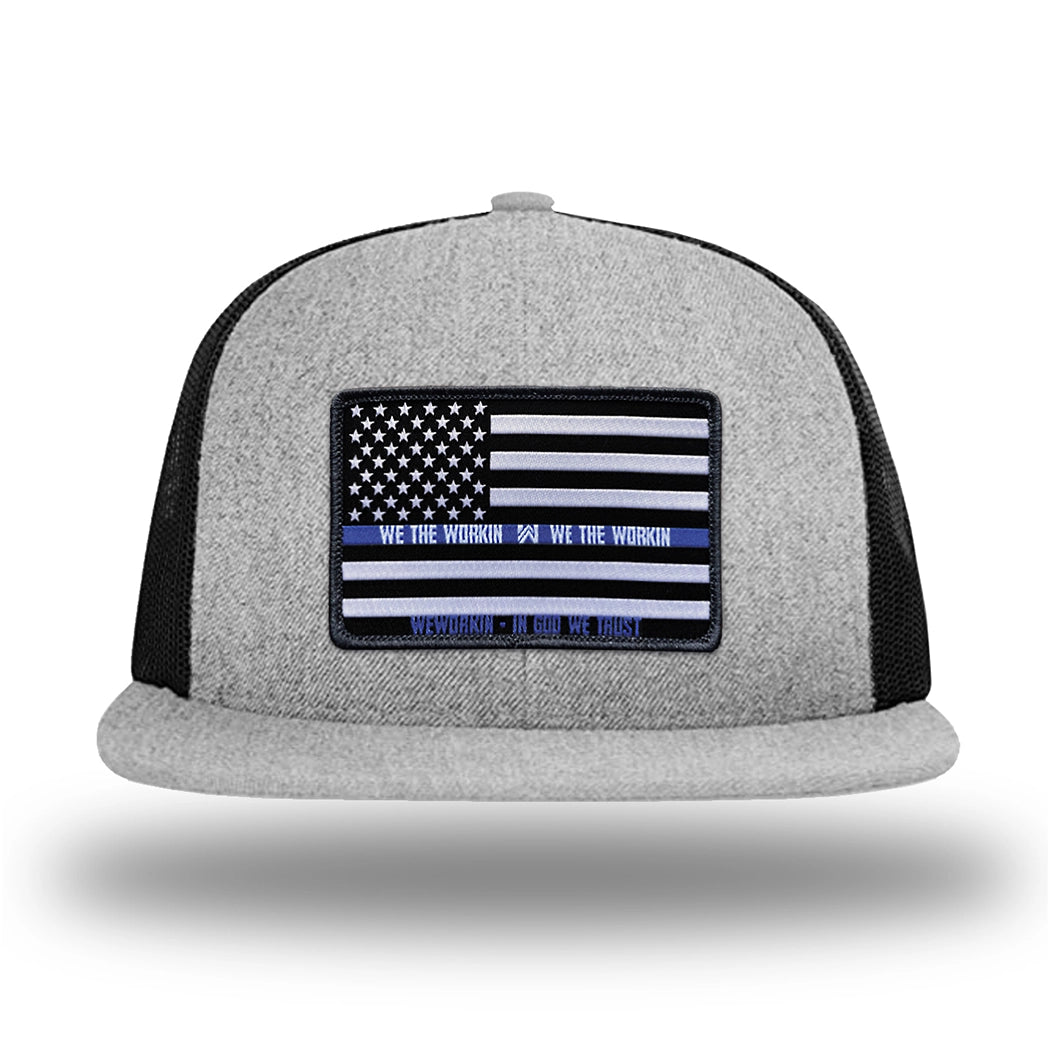 Heather Grey/Black WeWorkin hat—Richardson 511 brand snapback, flatbill trucker hat style. LEO FLAG woven patch with black merrowed edge is centered on the front panels.