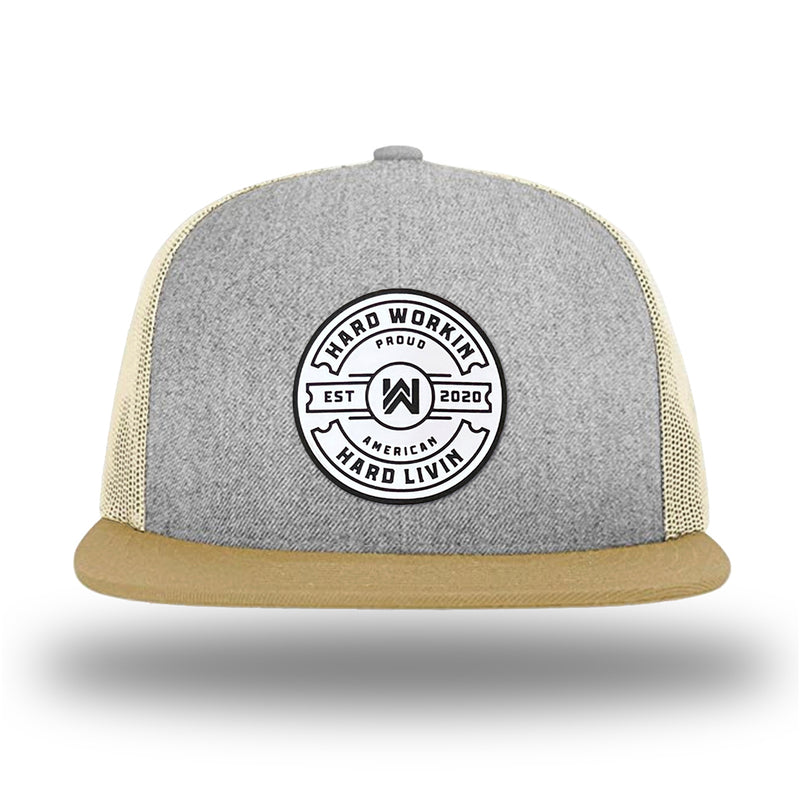 Heather Grey/Birch/Biscuit WeWorkin hat—Richardson 511 brand snapback, flatbill trucker hat style. "HARD WORKIN. HARD LIVIN." Proud American silicone circle patch is centered on the front panels.