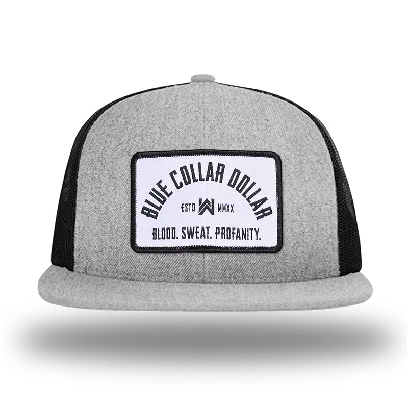 Heather Grey/Black WeWorkin hat—Richardson 511 brand snapback, flatbill trucker hat style. BLUE COLLAR DOLLAR ARCH (BCD-ARCH) woven patch with black merrowed edge, on a white background with black text, is centered on the front panels.