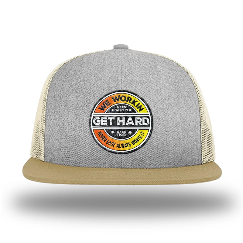 Heather Grey/Birch/Biscuit WeWorkin hat—Richardson 511 brand snapback, flatbill trucker hat style. WE WORKIN custom GET HARD patch made of thermoplastic, lightweight, durable material is centered on the front panels in orange to yellow fade and black colors.