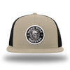 Khaki/Black WeWorkin hat—Richardson 511 brand snapback, flatbill trucker hat style. HARD WORK MATTERS woven patch with white merrowed edge, on a black background with HARD WORK MATTERS text encircling a Viking-style skull center graphic with MM XX on the left and right respectively—patch is centered on the front panels.